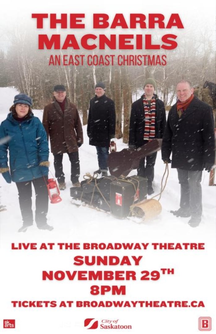 Image of the band the Barra MacNeils standing in snow and wearing winter clothes, with instruments on a sled.