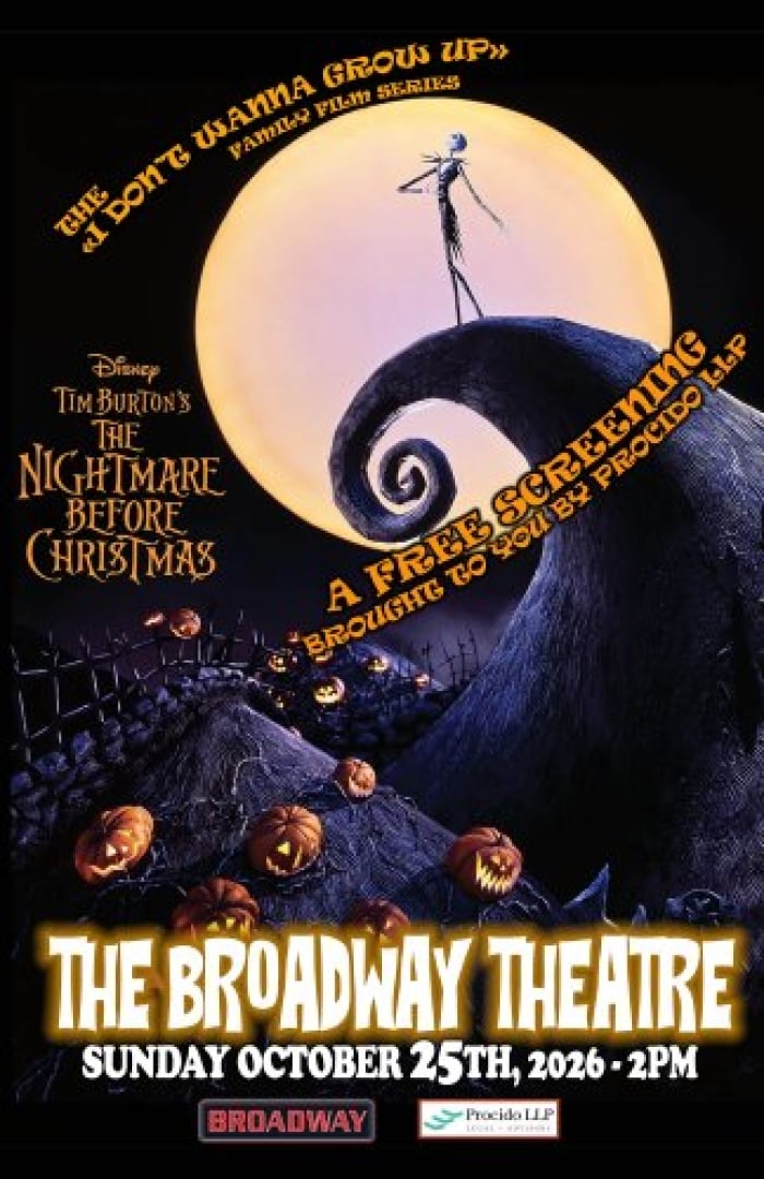 Image still of Jack Skellington from Nightmare Before Christmas, standing on a hill looking out to the sky as the full moon is behind him.