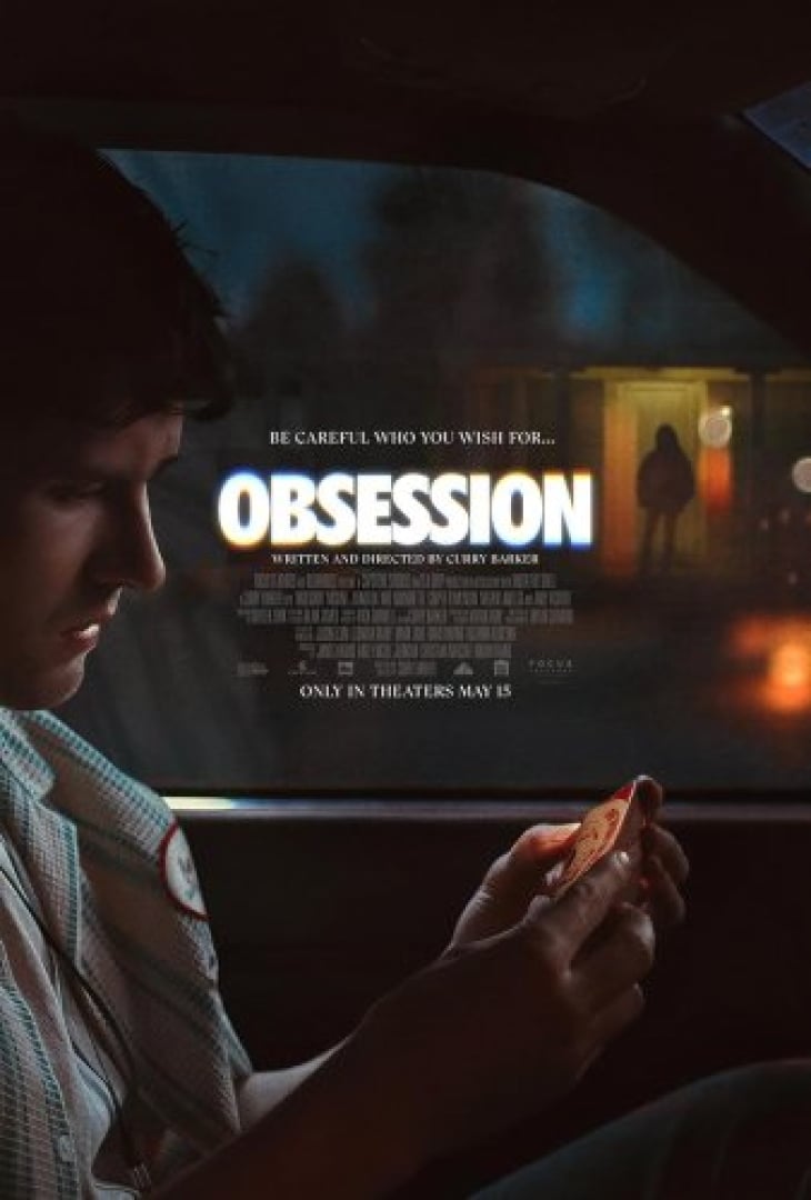 Image of a man reading a box in his car, and a silhouette watching in the doorway of a house in the back.