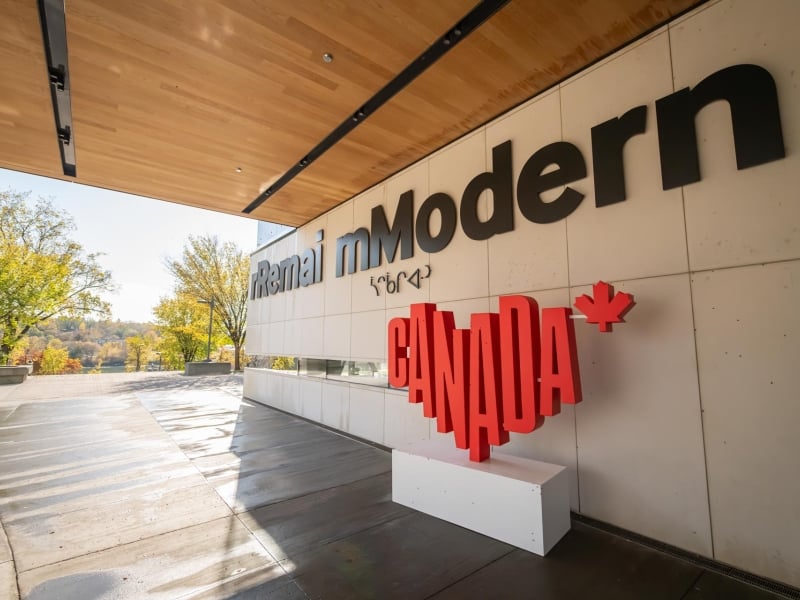 rRemai mModern Logo on a wall