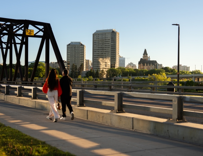 Couple Walking Victoria Bridge