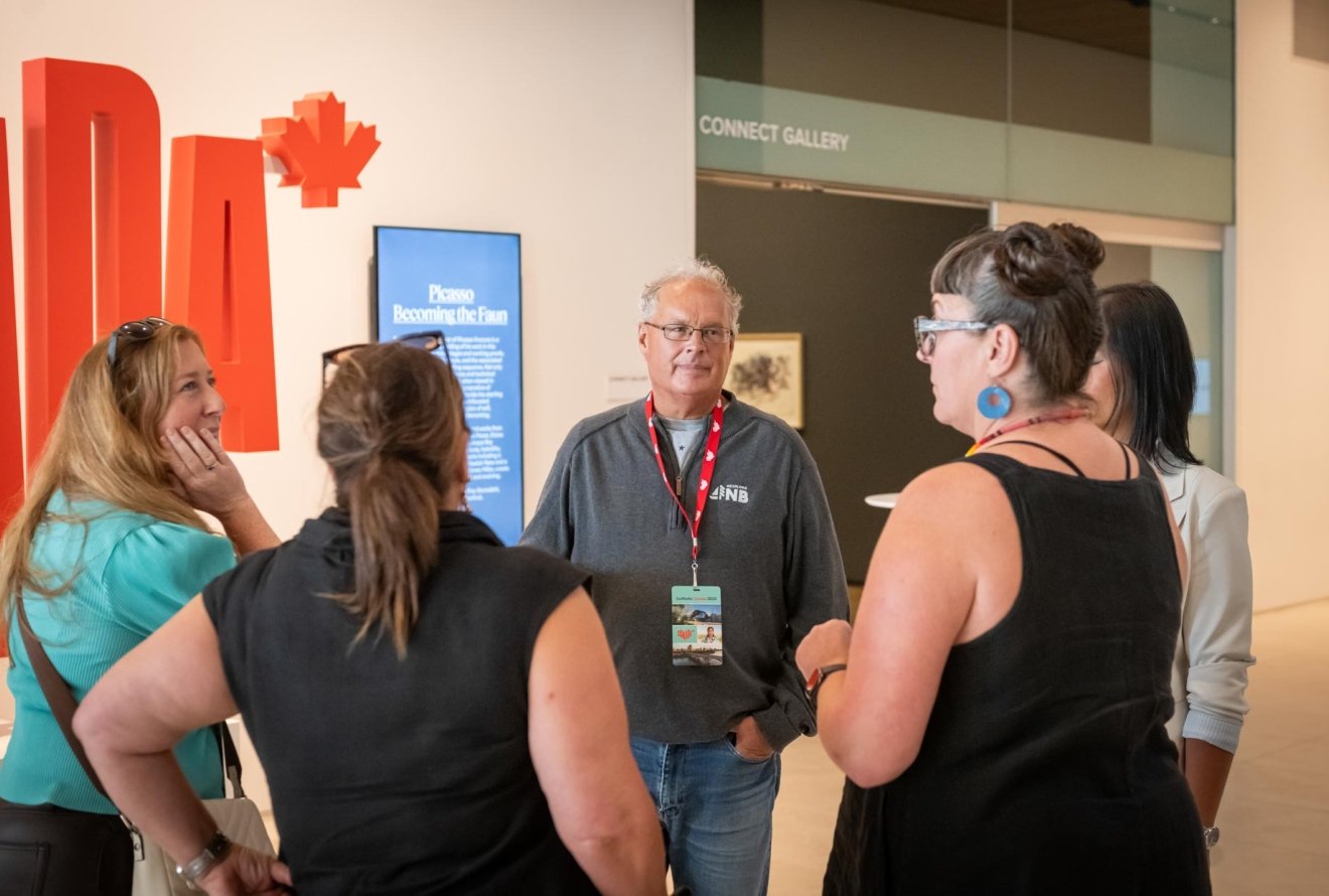 people conversing in a circle at Remai Modern
