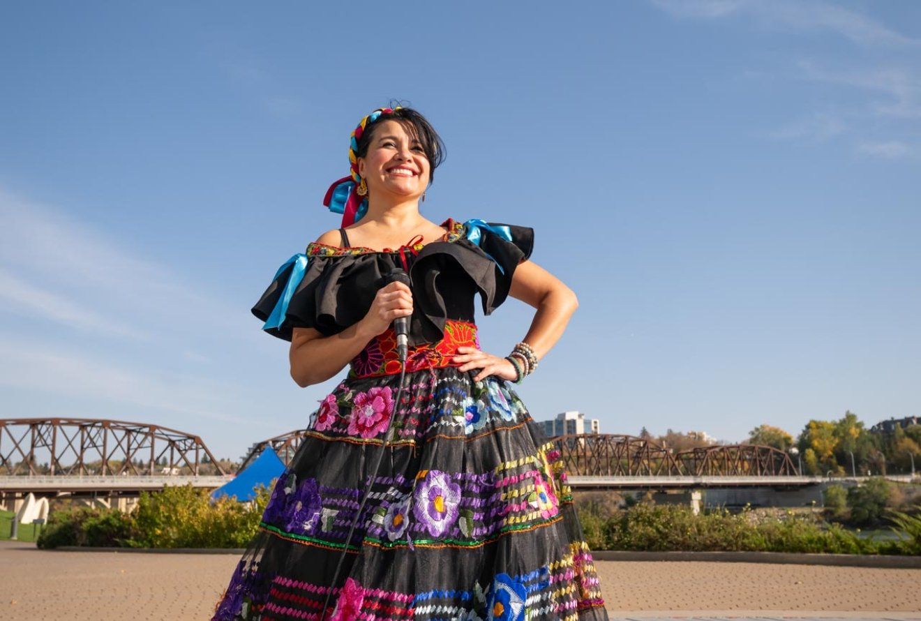 woman in traditional regalia at Remai Modern